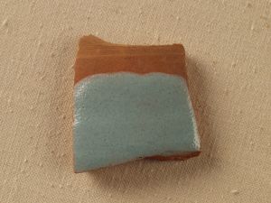 MUO-039818/02: Fragment ocakljene gline: fragment ocakljene gline